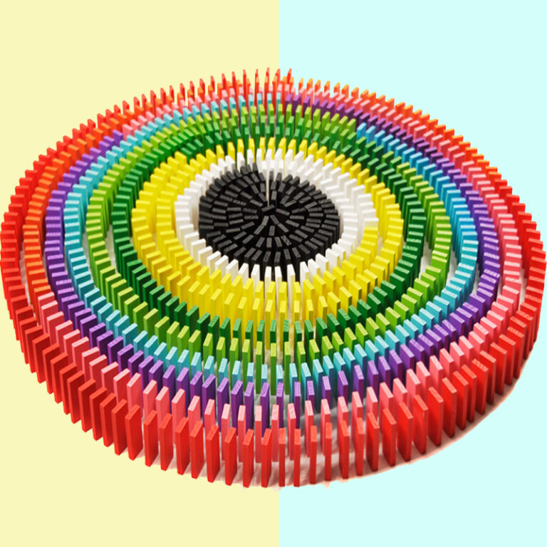 120-piece wooden domino set in bright colors for children