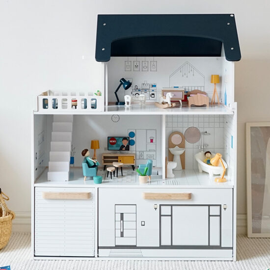 Large wooden princess dollhouse toy with multi-room layout