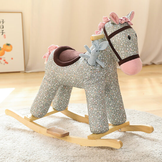 Plush rocking animal toy with wooden base and music