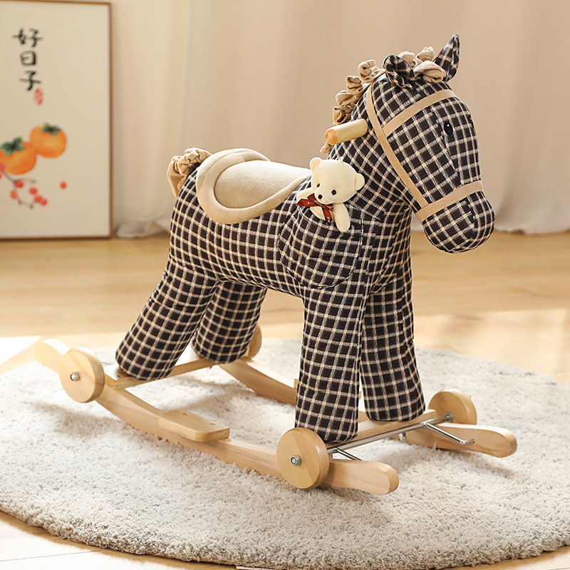 Plush rocking animal toy with wooden base and music