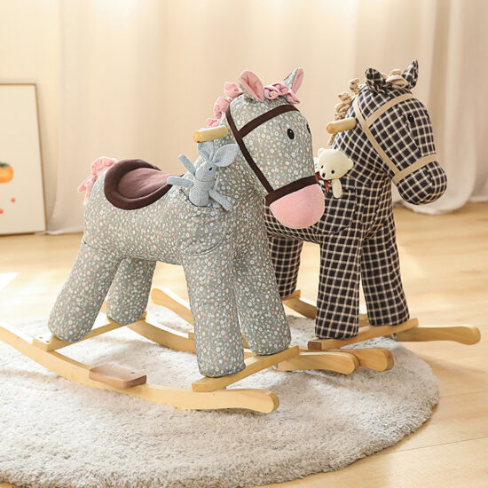 Plush rocking animal toy with wooden base and music