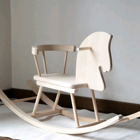 Minimalist wooden rocking horse ride-on for babies